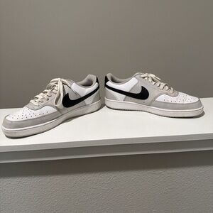 Nike White and Gray Sneakers with Black Swoosh
